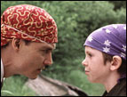 Johnny Depp as J.M. Barrie and Freddie Highmore as Peter Llewelyn-Davies in 'Finding Neverland'