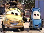 Luigi (voiced by Tony Shaloub) and Guido (voiced by Guido Quaroni) in 'Cars'