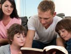 Christian family reading Bible